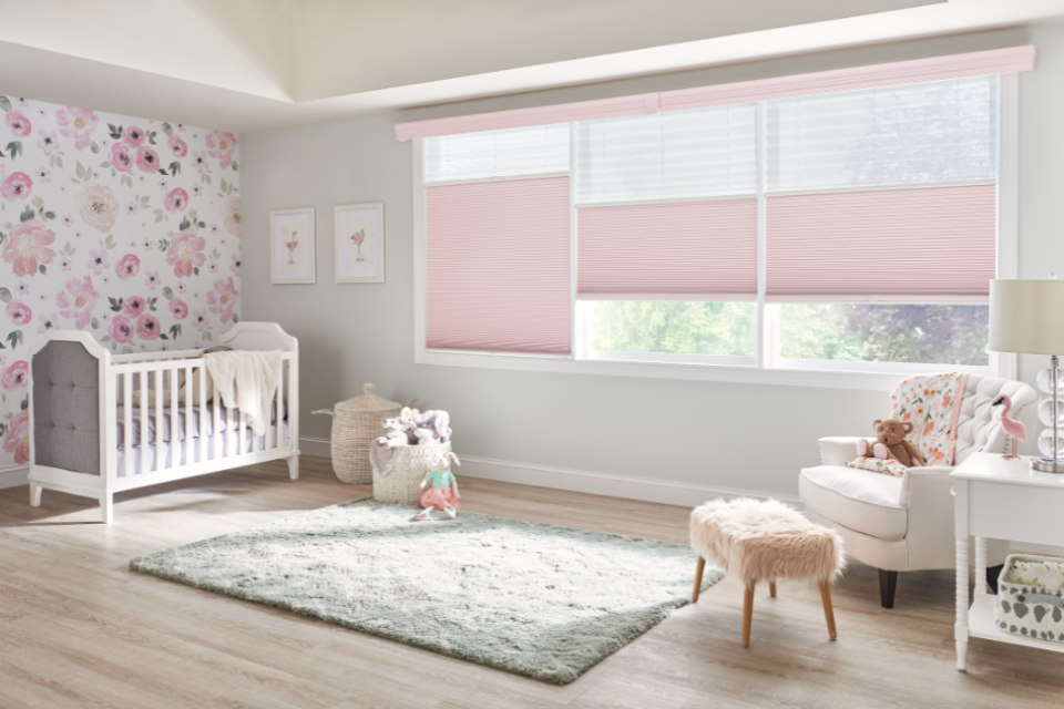 Children's bedroom with white oak flooring and blush pink decor